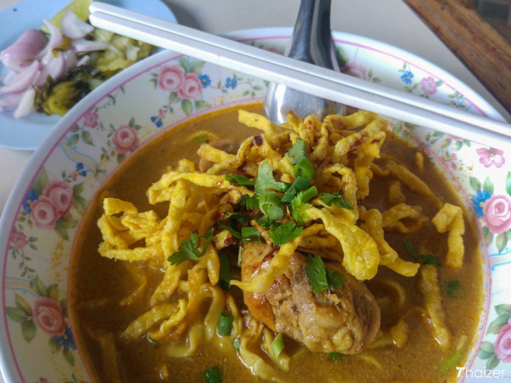 eating khao soi in Thailand